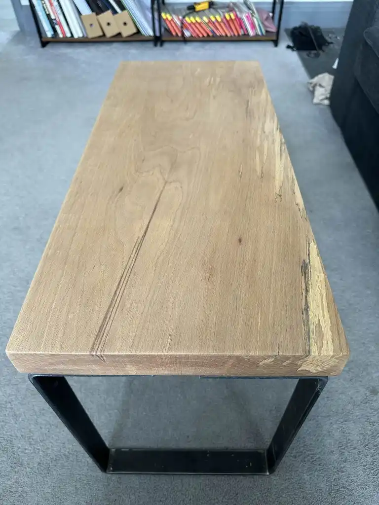 picture of coffee table with wooden top and metal legs